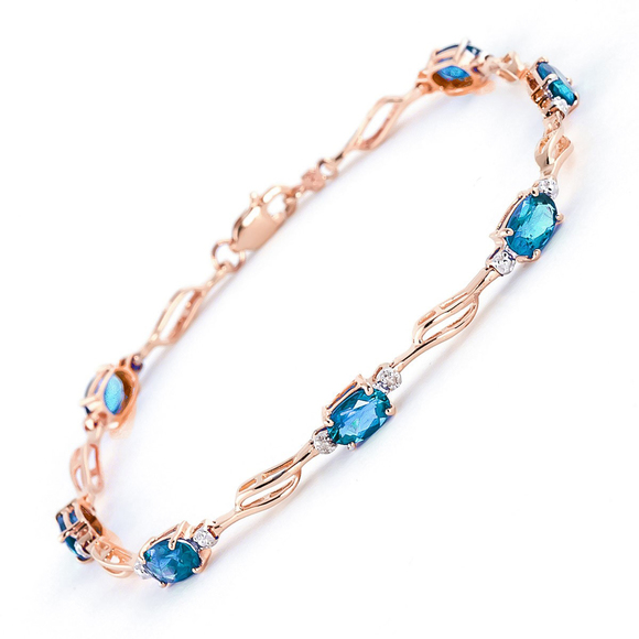14K. GOLD TENNIS BRACELET WITH BLUE TOPAZ & DIAMONDS (Rose Gold) - Picture 2 of 4